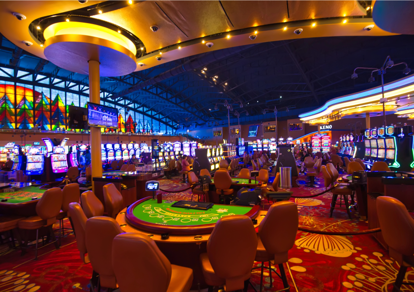 Grand casino gaming floor with table games and slots